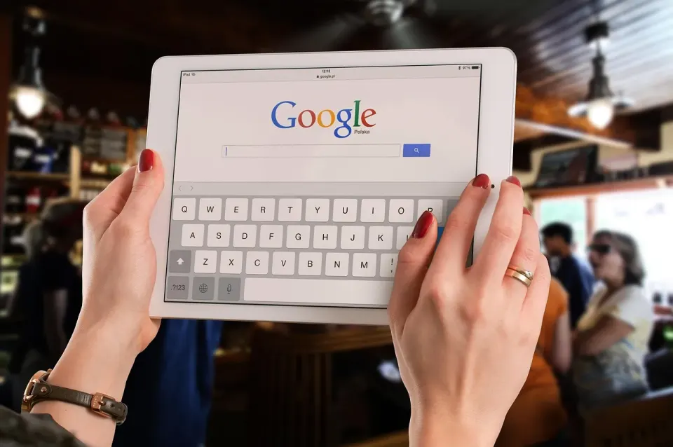 Tablet on a table displaying a business website layout