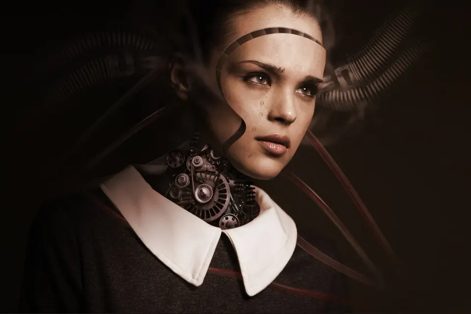 White humanoid robot face shown in profile against a dark background
